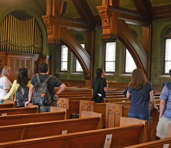 Nancy conducting tour of First Parish in 2016